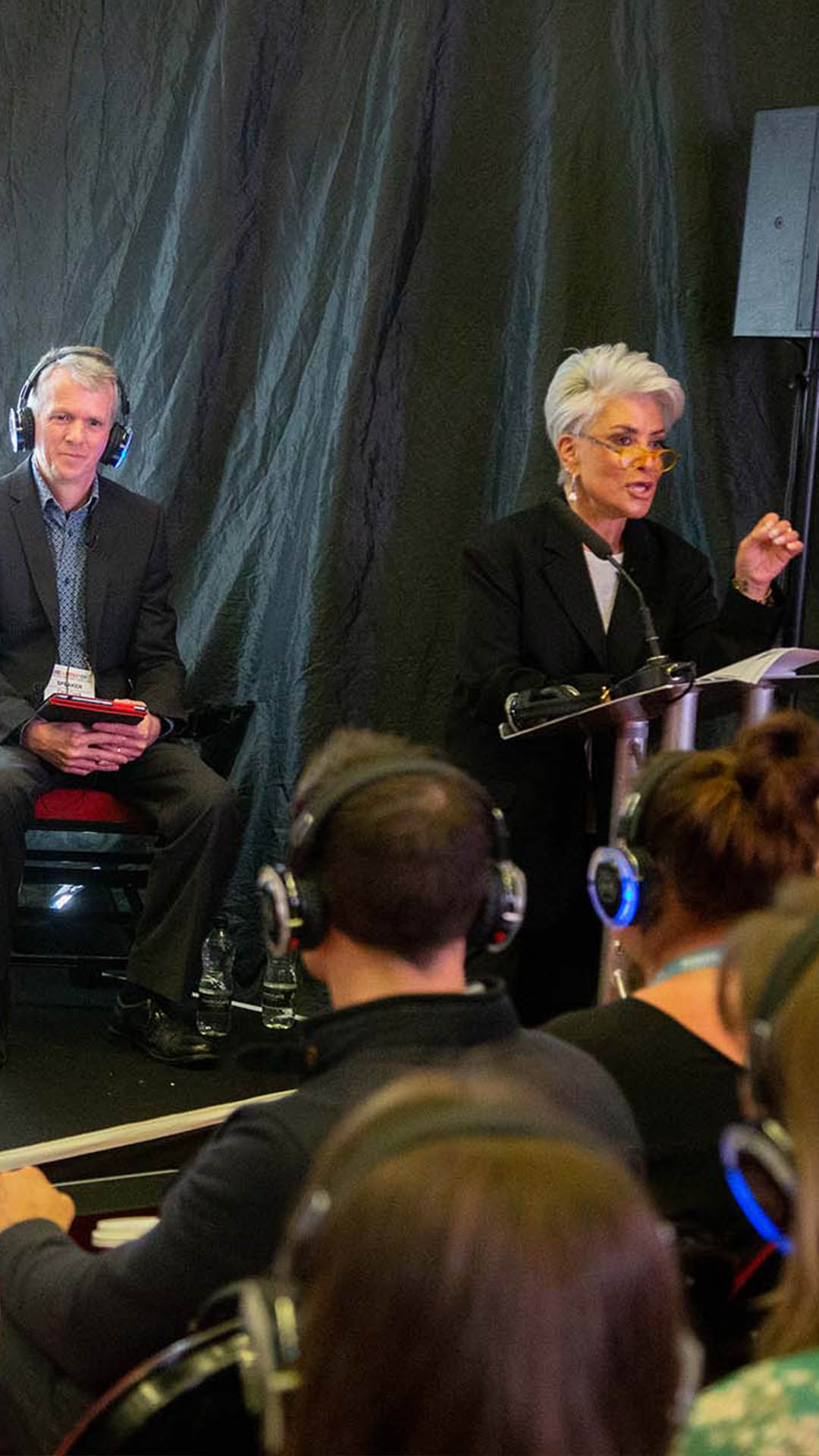 Liz Taylor Interviewer Debate Host